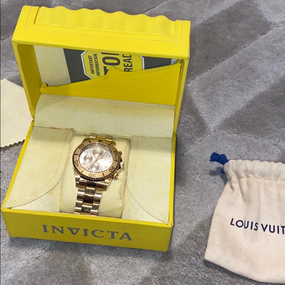 Gold invicta watch